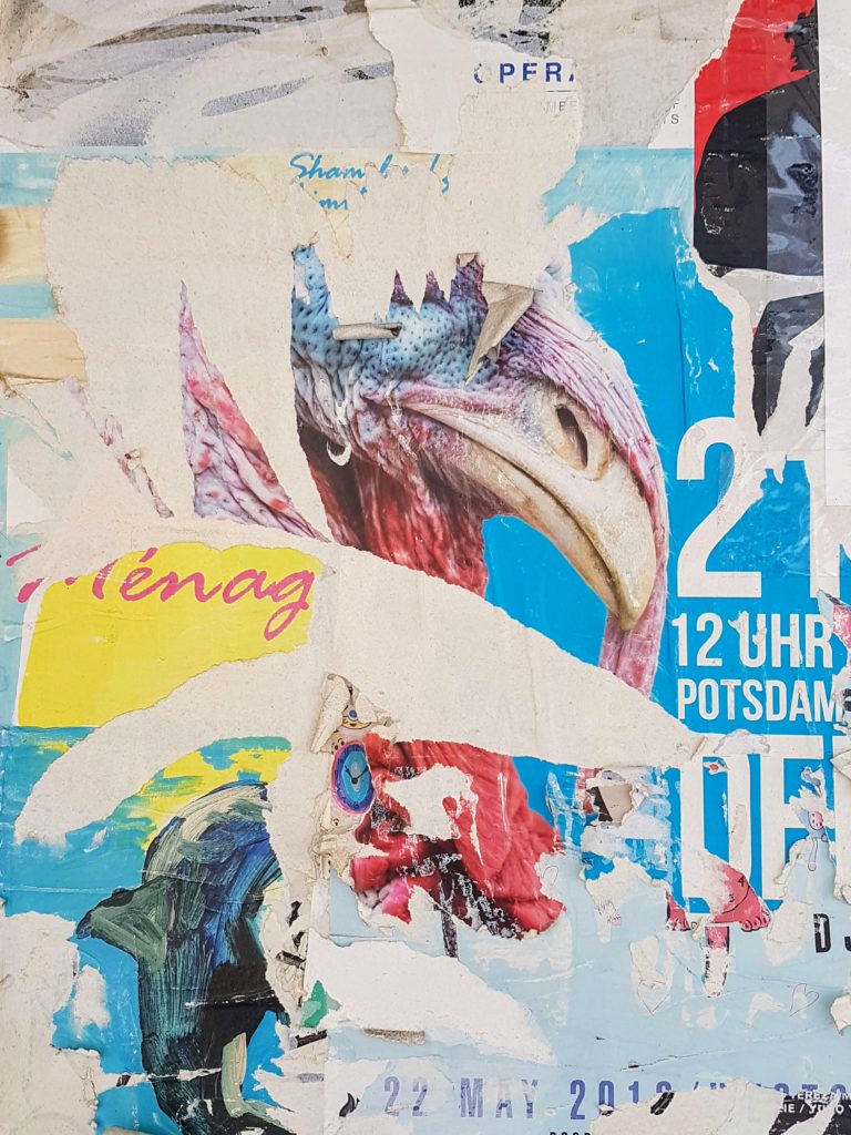 2 UHR POTSDAM 22 MAY - accidental collage of worn-out street posters..